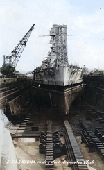 USS Nevada in Drydock 2 at the Puget Sound Naval Shipyard, Bremerton, Washington, United States for repairs following the Pearl Harbor Attack. Nevada was in drydock from 11 May to 30 Nov 1942.