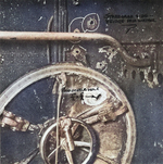 Bullet hole through USS Growler’s main hatch sustained 7 Feb 1943. Photo taken at the New Farm Submarine Base, Brisbane, Queensland, Australia, mid-Feb 1943.