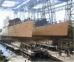 Hulls of the Mahan-class destroyers Cassin, left, and Shaw, right, on the ways at Philadelphia Navy Yard 26 Oct 1935 two days before they were both launched.