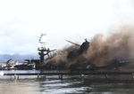 Yard Craft YG-21 alongside battleship USS Arizona fighting Arizona’s fires, 7 Dec 1941 Pearl Harbor, Hawaii.