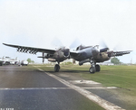 Lockheed P-38 Lightning at a training base in the United States, mid-1944. Note wing mounted HVAR air-to-surface rockets.