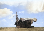 Escort carrier USS Windham Bay with a collapsed flight deck from Typhoon Connie five days earlier. Photo taken at Apra Harbor, Guam, 10 Jun 1945.