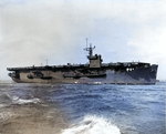 Auxiliary Aircraft Carrier USS Card underway in New York Harbor, Feb 1943. Note her Measure 21 paint scheme and also the plainly visible lines of her merchantman hull.