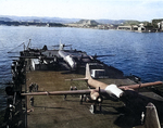 Postwar photo of surrendered Japanese aircraft secured to the deck of escort carrier USS Bogue for transportation to the United States, 25 Dec 1945, Yokosuka, Japan. Photo 1 of 2.