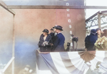 United States First Lady Mrs. Lou Hoover christening Ranger upon the ship’s launch at Newport News, Virginia, 25 Feb 1933. Behind Mrs. Hoover, in the dark hat, is Secretary of the Navy Charles Adams. Photo 1 of 2.