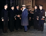 United States Secretary of the Navy Frank Knox greeting Naval officers aboard USS Ranger at Scapa Flow, Scotland, 21 Sep 1943.