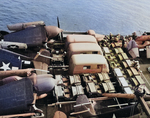 USS Corregidor ferrying trucks, jeeps, and aircraft, mid-1940s