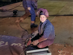 Female welder working at Kaiser Richmond Shipyards, Richmond, California, United States, Feb 1943