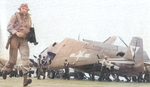 TBM Avengers of Torpedo Squadron VT-19 on the flight deck of USS Lexington (Essex-class) being readied for a strike against targets on Formosa (Taiwan), 12 Oct 1944.