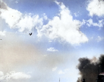 A damaged Zero fighter left a trail of smoke above Pearl Harbor, US Territory of Hawaii, 7 Dec 1941