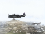 TBM Avenger torpedo planes of Composite Squadron 84 from USS Makin Island flying over Ie Shima, Ryukyu Islands, Japan, 16 Apr 1945