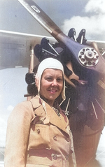 Turkish female aviator Sabiha Gökçen posing in front of a Bre.19 light bomber, 1937-1938