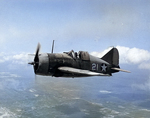 Lieutenant Commander Joseph C. Clifton in flight in a Buffalo fighter, 2 Aug 1942, photo 1 of 2