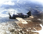 Lieutenant Commander Joseph C. Clifton in flight in a Buffalo fighter, 2 Aug 1942, photo 2 of 2