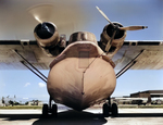 Close-up of the nose of a PBY Catalina aircraft being serviced at Naval Air Station Corpus Christi, Texas, United States, Aug 1942