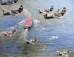 F4U-4 Corsair aircraft of US Navy squadron VF-75 and SB2C-4E Helldiver aircraft of US Navy squadron VT-75 in flight over USS Franklin D. Roosevelt, western Atlantic Ocean, 5 May 1946