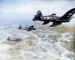 FG-1D Corsair fighters of US Marine Corps squadron VMF-323 in flight over Okinawa, Japan, 10 Jun 1945