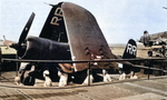 FG-1D Corsair fighter of US Navy squadron VBF-88 in an elevator aboard USS Yorktown, Aug 1945