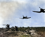 US Marines fighting in Korea, 1 Jan 1953; note Corsair in flight overhead