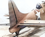 SBD-2 Dauntless aircraft of US Marine Corps squadron VMSB-241 at Midway Atoll, 4 Jun 1942, photo 1 of 2; note damage sustained during attack on Hiryu