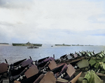 Four Essex-class carriers at anchor at Ulithi, Caroline Islands, about 1600 on 2 Dec 1944; L to R: Wasp, Yorktown, Hornet, Hancock; viewed from Ticonderoga with sight of her F6F-5 Hellcat fighters