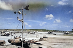 B-24J Liberator bombers, C-47 Skytrain transports, and B-29 Superfortress bombers at Kagman Field, Saipan, Mariana Islands, 1944