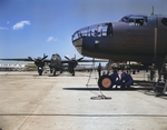 North American Aviation factory workers completing the construction of a B-25 Mitchell bomber, Inglewood facility, Los Angeles, California, United States, Oct 1942, photo 2 of 2