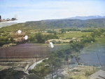 Toyohara Airfield under US parafrag attack, Taichu (now Taichung), Taiwan, 1945, photo 1 of 2