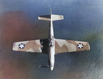 P-51A Mustang fighter in flight, viewed from the top, Oct 1940-May 1942