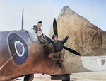 USAAF Colonel Harold B. Willis, Major Marvin L. McNickle, and Captain A. E. Vinson observing an aircraft in flight from a Spitfire aircraft, Gibraltar, 1942