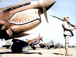 Chinese soldier guarding P-40 Warhawk fighters of the AVG 