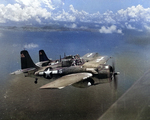 FM-2 Wildcat of USS White Plains, fly an escort mission, probably during air strikes on Japanese facilities on Rota Island, Marianas, 24 Jun 1944