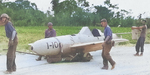 American troops moving captured MXY7 Ohka aircraft I-10, Kadena airfield, Okinawa, Japan, Apr 1945