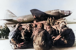 Japanese Navy aviators resting; note G4M2e Model 24 bomber with MXY7 Ohka Model 11 aircraft in background