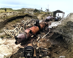 Three Japanese Type A-class midget submarines wrecked by demolition charges, at a former Japanese base on Kiska Island, Aleutian Islands, 7 Sep 1943, photo 1 of 2