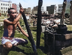 A Japanese civilian in the ruins of Yokohama, Japan, 1945