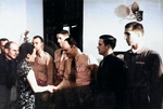 Song Meiling awarding Richard Cole, Henry Potter, Edgar McElroy (shaking hands), Richard Joyce, and Jack Ahren Sims for Doolittle Raid success, Chongqing, China, 29 Jun 1942