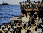 Two sailors of Liscome Bay buried at sea from the deck of an US Coast Guard assault transport, Nov 1943