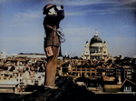 An aircraft spotter atop a London building, St. Paul