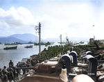 Allied soldiers and vehicles waited to be loaded prior to a practice landing, possibly for the invasion of Southern France, held near Mondragone, Italy, 31 Jul 1944