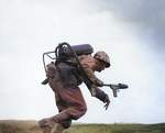 Man of US 9th Marines with flamethrower, Motoyama Airfield (Airfield Number 2), Iwo Jima, Feb 1945