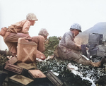 Men of the US 5th Marines Division manning a machine gun, Iwo Jima, Japan, 22 Feb 1945