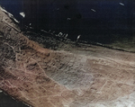 Aerial view of southern Iwo Jima, Japan, 7 Mar 1945; photo taken from an aircraft of USS Anzio