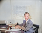 Project Director Paul Taylor of Jerome War Relocation Center at his office, Arkansas, United States, 18 Nov 1942, photo 1 of 2