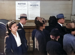 Japanese Americans in front of poster with internment orders, California, United States, 1942