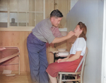 Japanese-American dentist and patient, Jerome War Relocation Center, Arkansas, United States, 17 Nov 1942