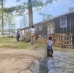 Japanese-American children playing in Block 7 of Jerome War Relocation Center, Arkansas, United States, 18 Nov 1942