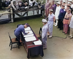 General Yoshijiro Umezu signing the instrument of surrender, Tokyo Bay, Japan, 2 Sep 1945, photo 1 of 4