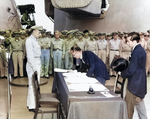 Mamoru Shigemitsu signing the surrender instrument aboard USS Missouri, Tokyo Bay, Japan, 2 Sep 1945, photo 1 of 4