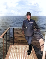 Lieutenant General Shunzaburo Mugikura aboard Portland to surrender Truk, Caroline Islands, which is visible in background, 2 Sep 1945